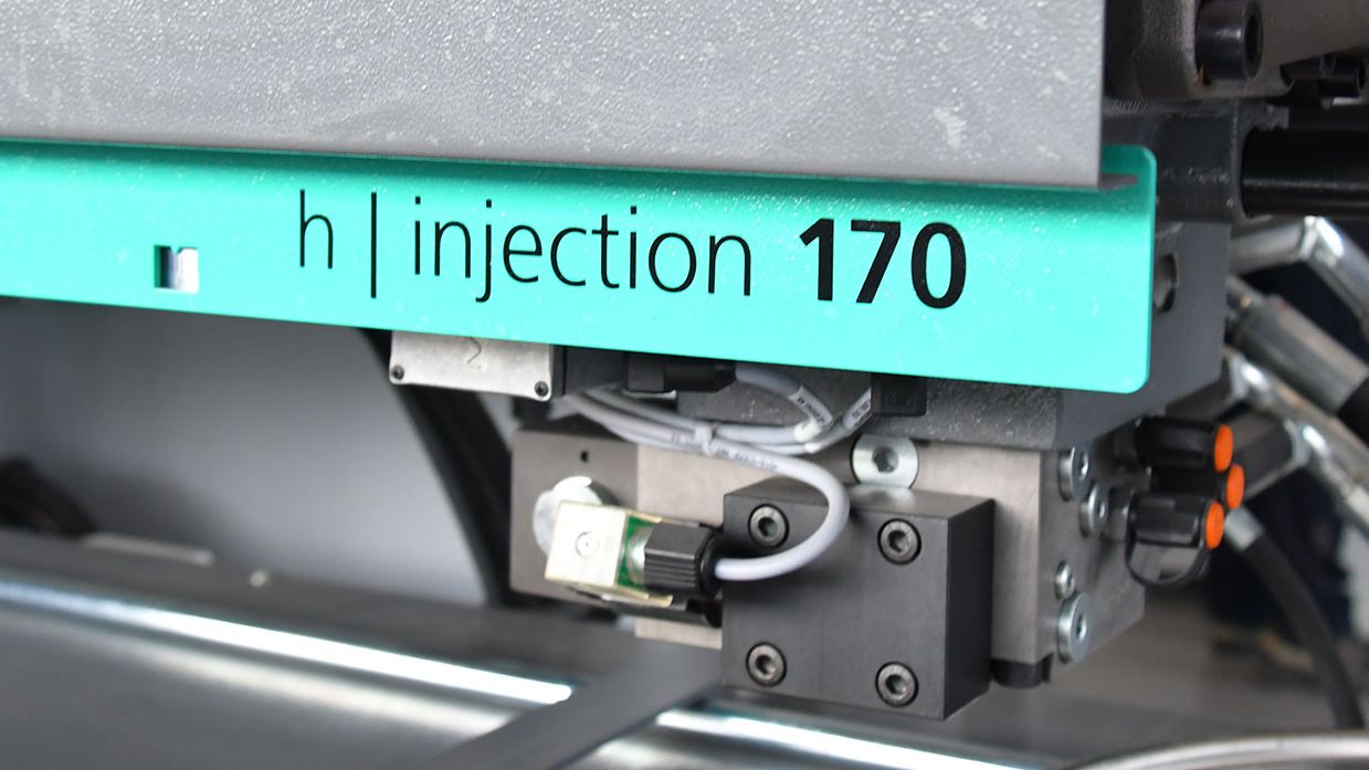 Header-technologie-closeupmachine2-mim
